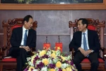 Le président de Xinhua travaille avec des responsables du journal Nhan Dan