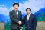 Le Premier ministre Pham Minh Chinh (droite) a reçu le 6 août à Hanoï le ministre japonais de la Défense Kihara Minoru, en visite officielle au Vietnam. Photo : VNA
