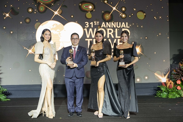 Représentants du conseil d'administration du parc national de Cuc Phuong aux World Travel Awards. Photo VNA représentant du Parc national de Cuc Phuong.jpg
