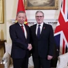 Le secrétaire général du Parti communiste du Vietnam (PCV), Tô Lâm (gauche), et le Premier ministre britannique, Keir Starmer. Photo: VNA