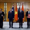 Les dirigeants To Lam et Anthony Albanese à la cérémonie de remise des documents de coopération entre les deux pays. Photo : VNA