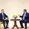 Le Premier ministre Pham Minh Chinh (droite) et le directeur général de RZD, Oleg Belozyorov. Photo: VNA