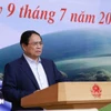 Le Premier ministre Pham Minh Chinh s'exprime lors de la réunion. Photo: VNA