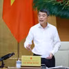 Le Premier ministre lê Minh Hung s'exprime lors de la réunion. Photo: VNA