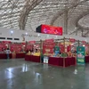 L’espace « Produits agricoles vietnamiens – Rayonnement des couleurs du printemps » présente des produits agricoles, forestiers et aquatiques clés, des spécialités régionales, des produits destinés à la consommation du Têt, des produits OCOP (One Commune One Product ou A chaque commune son produit), ainsi que des produits bénéficiant d’indications géographiques du Vietnam. Photo: baomoi.com