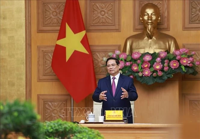 Le Premier ministre vietnamien Pham Minh Chinh lors de la rencontre. Photo : VNA. 