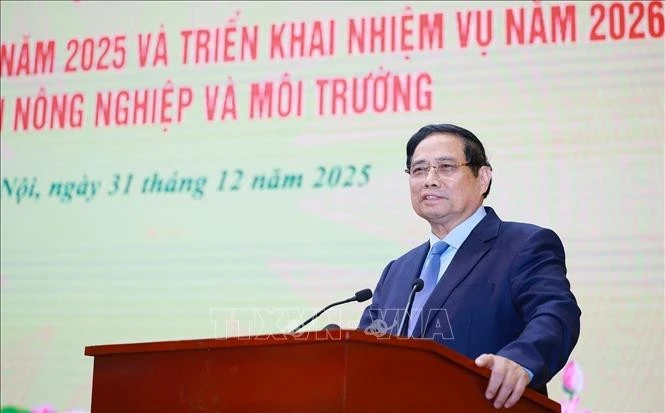 Le Premier ministre Pham Minh Chinh prend la parole à la conférence de bilan des activités de 2025 et de la période 2021-2025 et de déploiement des missions pour 2026 du secteur de l’agriculture et de l’environnement. Photo : VNA