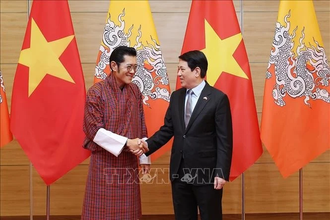Le président vietnamien, Luong Cuong, et le roi du Bhoutan, Jigme Khesar Namgyel Wangchuck. Photo : VNA. 