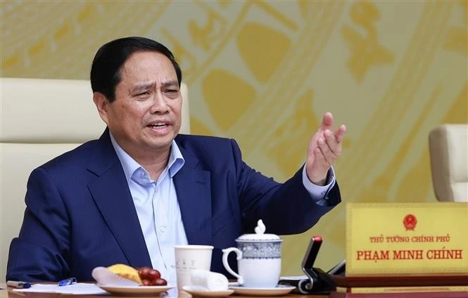 Le Premier ministre Pham Minh Chinh s'exprime lors de la réunion. Photo : VNA. 