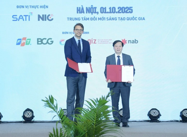 Echange d'un accord portant sur le déploiement du projet « Énergie propre, abordable et sûre pour l’Asie du Sud-Est – mise en œuvre au Vietnam » (CASE Vietnam). Photo . VNA.