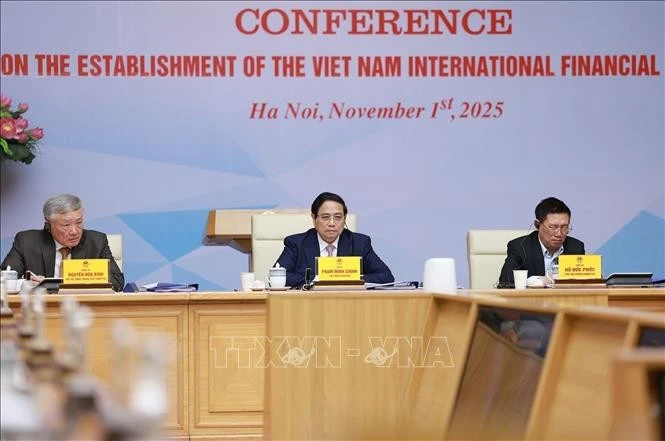 Le Premier ministre Pham Minh Chinh préside une conférence sur la création d'un centre financier international au Vietnam. Photo : VNA.