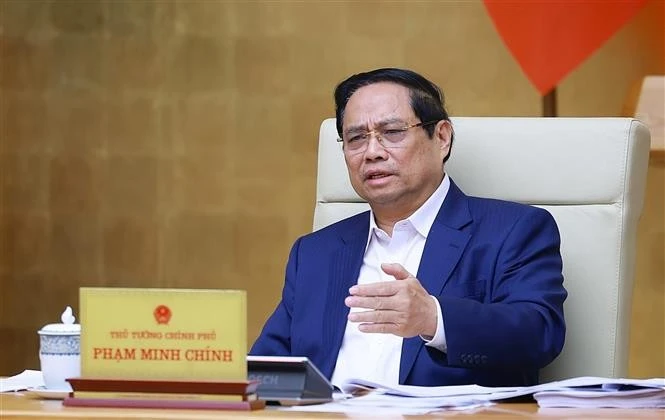 Le Premier ministre Pham Minh Chinh lors de la réunion. Photo : VNA.