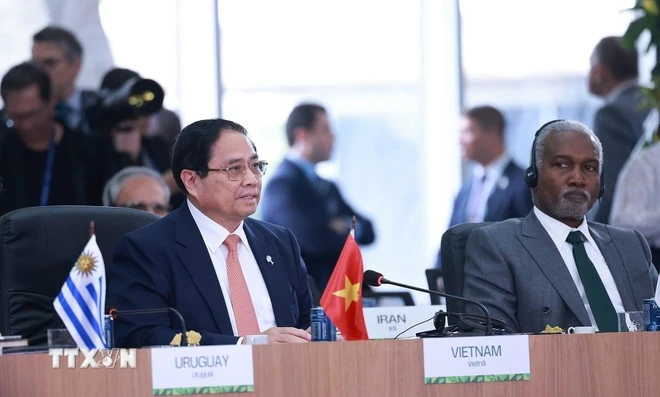 Le Premier ministre Pham Minh Chinh s’exprime lors d’une session de haut niveau tenue le 7 juillet sur l’environnement, la COP30 et la santé mondiale dans le cadre du Sommet élargi des BRICS 2025 à Rio de Janeiro. Photo : VNA