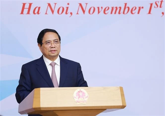 Le Premier ministre Pham Minh Chinh s’exprimant lors de la conférence, à Hanoi, le 1er novembre. Photo : VNA.