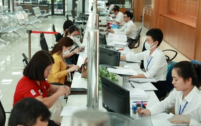La conclusion n° 205-KL/TW énonce le mécanisme de mise en œuvre du recrutement spécial sans examen des fonctionnaires et des employés du secteur public. Photo d'illustration : laodong.vn