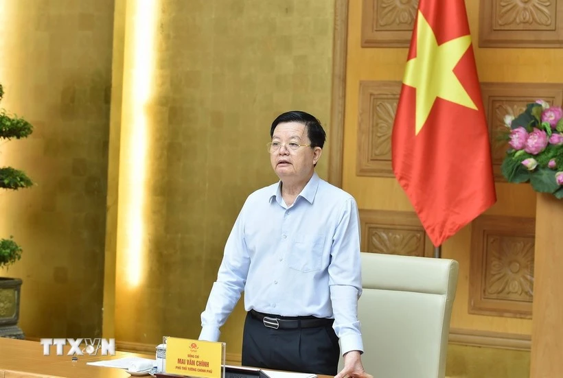 Le vice-Premier ministre Mai Van Chinh, président du comité de pilotage de l’exposition nationale marquant le 80e anniversaire de la Fête nationale du Vietnam, s’exprime lors de la réunion hybride avec les ministères, agences et autorités provinciales concernés, le 25 juillet. Photo : VNA