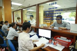 Activités au Département des impôts de Hanoi. Photo: VNA