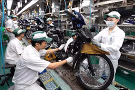 Une chaîne de production de moto de l'usine Honda Phuc Yên, dans la province de Vinh Phuc. Photo: VNA