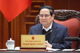 Le Premier ministre Pham Minh Chinh lors de la réunion, à Hanoi, le 10 février. Photo: VNA