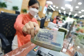 Depuis le début de l’année, les banques ont réduit leurs taux d’intérêt afin d’aider les entreprises à accéder aux capitaux. Photo : tinnhanhchungkhoan.vn