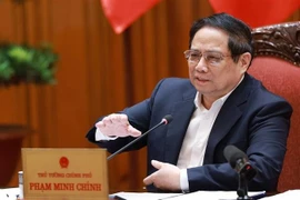 Le Premier ministre Pham Minh Chinh lors de la réunion, à Hanoi, le 1er juillet. Photo: VNA