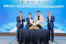 Lors de la cérémonie de signature du partenariat entre FPT et Audax. Photo: vietnamnet.vn