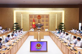 Vue d’ensemble de la conférence faisant le bilan d’un mois de fonctionnement de ce système, à Hanoi, le 28 juillet. Photo : VNA