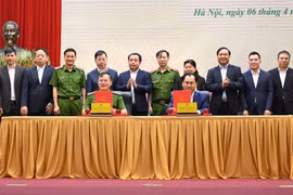 Vue de la cérémonie de signature du protocole d’accord entre le ministère de l’Agriculture et de l’Environnement et le ministère de la Sécurité publique. Photo : VNA