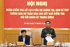Le général Phan Van Giang, vice-secrétaire de la Commission militaire centrale et ministre de la Défense s’exprime lors de la conférence. Photo: VNA
