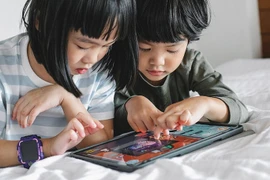 À l’ère de la technologie numérique, s’unir pour créer un cyberespace sûr pour les enfants n’est pas seulement une préoccupation du Vietnam mais aussi du monde entier. Photo: Asurion