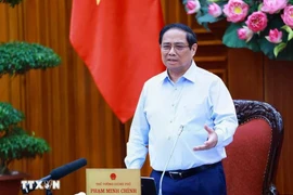 Le Premier ministre Pham Minh Chinh assume la direction du Comité de pilotage des centres financiers régional et international du Vietnam. Photo : VNA