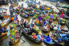Apparu au début du 20e siècle, le marché flottant de Cai Rang se trouve au croisement des rivières Cân Thơ, Dâu Sâu, Cai Son et Cai Rang. Photo: thamhiemmekong.com