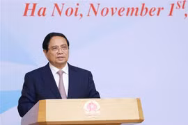 Le Premier ministre Pham Minh Chinh s’exprimant lors de la conférence, à Hanoi, le 1er novembre. Photo : VNA
