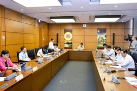 Débats parlementaires sur la loi relative à l’entraide judiciaire en matière civile. Photo: VNA