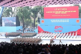 Cérémonie nationale et défilé pour célébrer le 50e anniversaire de la libération du Sud et de la réunification nationale, à Hô Chi-Minh-Ville, le 30 avril. Photo: VNA