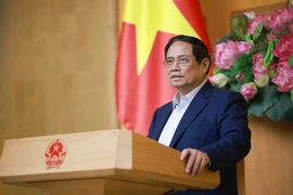 Le Premier ministre Pham Minh Chinh lors de la réunion, à Hanoi, le 9 juillet. Photo : VNA