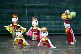 Grâce à l'engagement d'artistes passionnés qui se consacrent à la préservation et à la promotion de cet art populaire, les marionnettes sur l'eau de Dào Thuc jouissent aujourd'hui d'une large reconnaissance. Photo: VNP