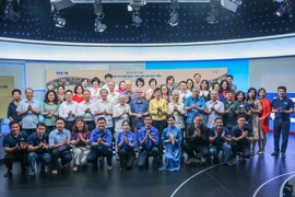 Les délégués participant au colloque, à Hanoi, le 15 octobre. Photo: VNA