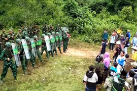 Scène de l’exercice conjoint de protection frontalière entre le Vietnam et le Laos. Photo: VNA