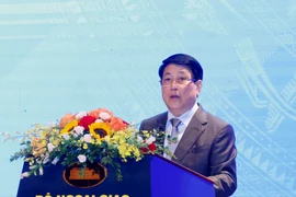 Le président Luong Cuong s’exprime lors du séminaire international, à Hanoi, le 23 avril. Photo : VNA