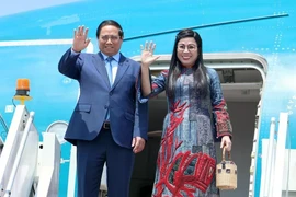 Le Premier ministre Pham Minh Chinh et son épouse. Photo : VNA
