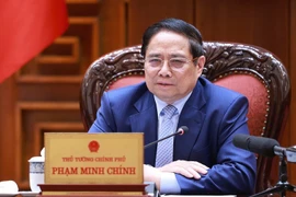 Le Premier ministre Pham Minh Chinh lors de la réunion, à Hanoi, le 28 juin. Photo : VGP