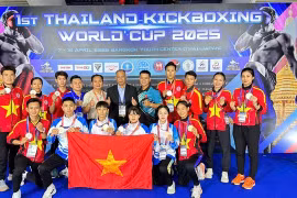 Athlètes et entraîneurs vietnamiens lors du tournoi. Photo: VNA