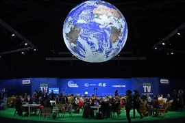 Des délégués participent à la COP26 à Glasgow, le 2 novembre 2021. Photo : AFP/VNA