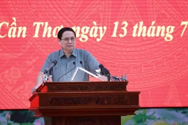 Le Premier ministre Pham Minh Chinh s’exprime lors de la conférence, à Cân Tho, le 13 juillet. Photo : VNA