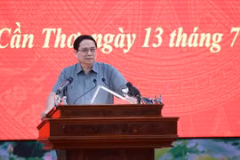 Le Premier ministre Pham Minh Chinh s’exprime lors de la conférence, à Cân Tho, le 13 juillet. Photo : VNA