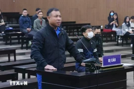 L’accusé Nghiêm Quang Minh lors de son procès devant le Tribunal populaire de Hanoi. Photo : VNA