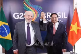 Le Premier ministre Pham Minh Chinh (à droite) et le président brésilien Luiz Inácio Lula da Silva. Photo: VNA