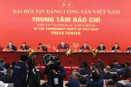 Le secrétaire général du Parti Tô Lâm (centre) lors de la conférence de presse internationale sur les résultats du 14e Congrès national du Parti, à Hanoi, le 23 janvier. Photo : VNA