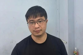 Pho Duc Nam, connu sous le nom de "M. Pips", arrêté par la police. Photo: VNA